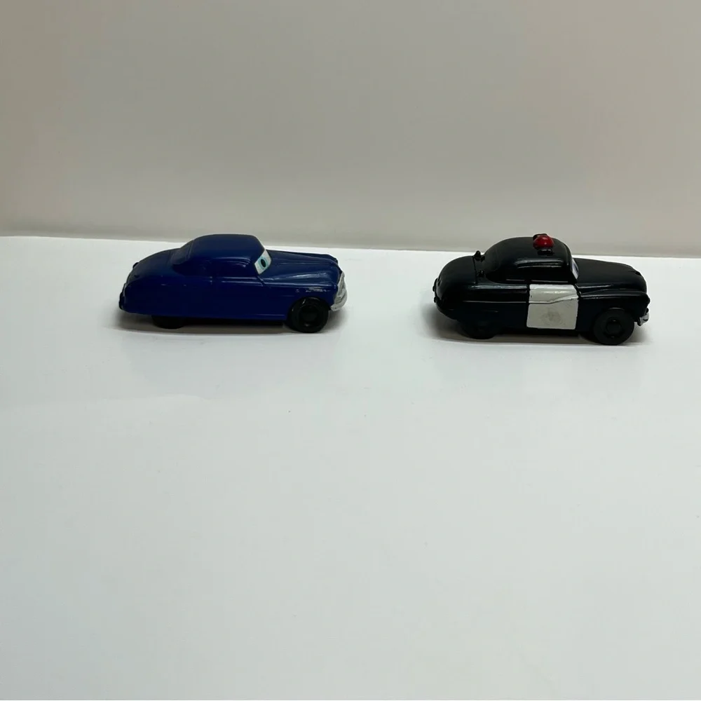 disney pixar cars doc hudson and sheriff‎ kellogg promo 2006